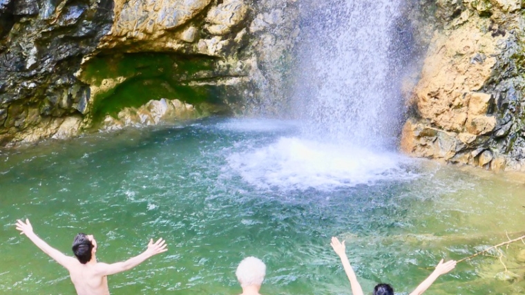 Image of 3 bathers in the waterfall at Molino Del Rey, Spain. Click to purchase the International Education in Vocal Wellness Course November 2025